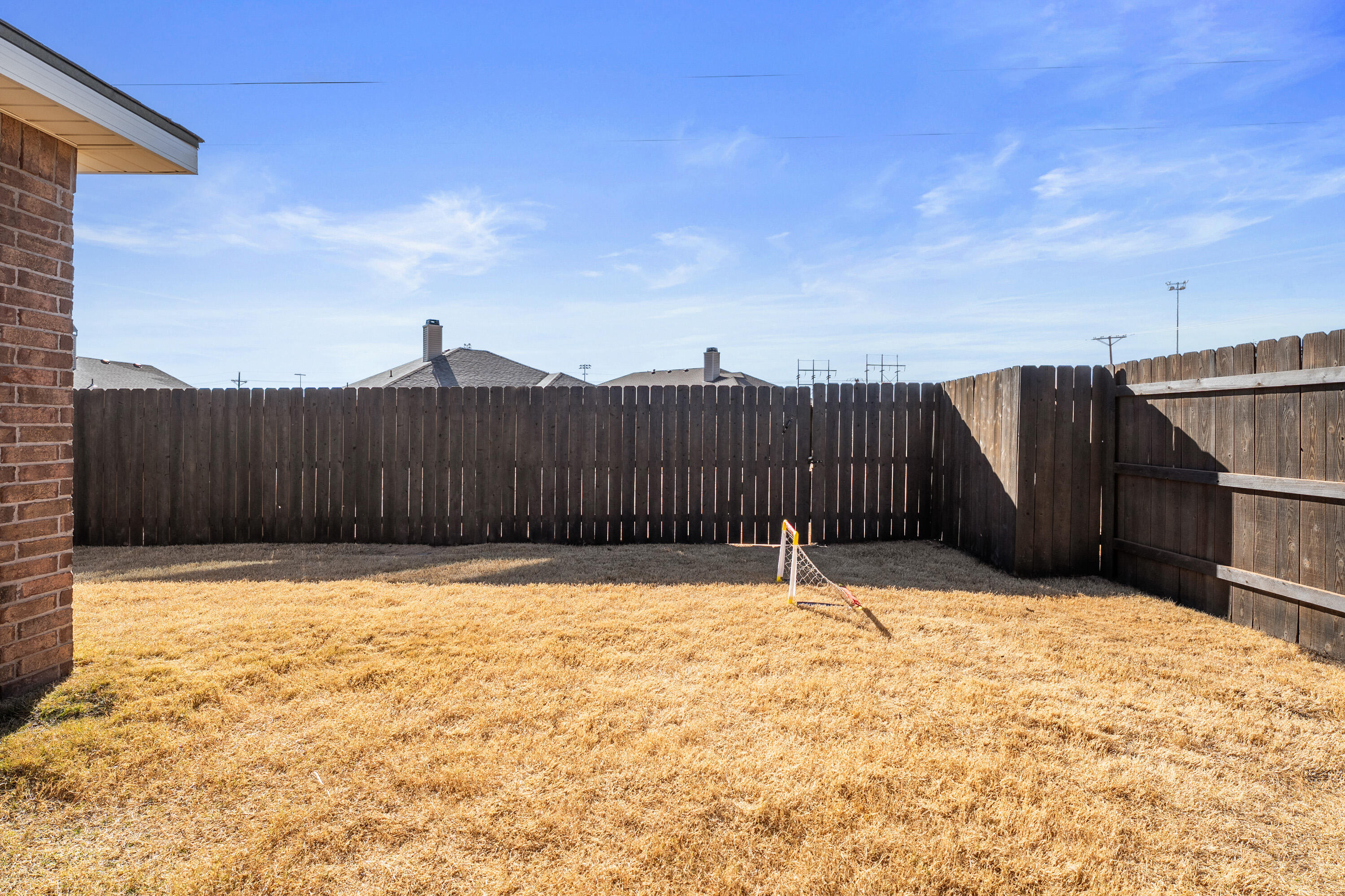 6827 39th Street Lubbock, TX 79407 - Photo 21 of 25 a view of wooden fence