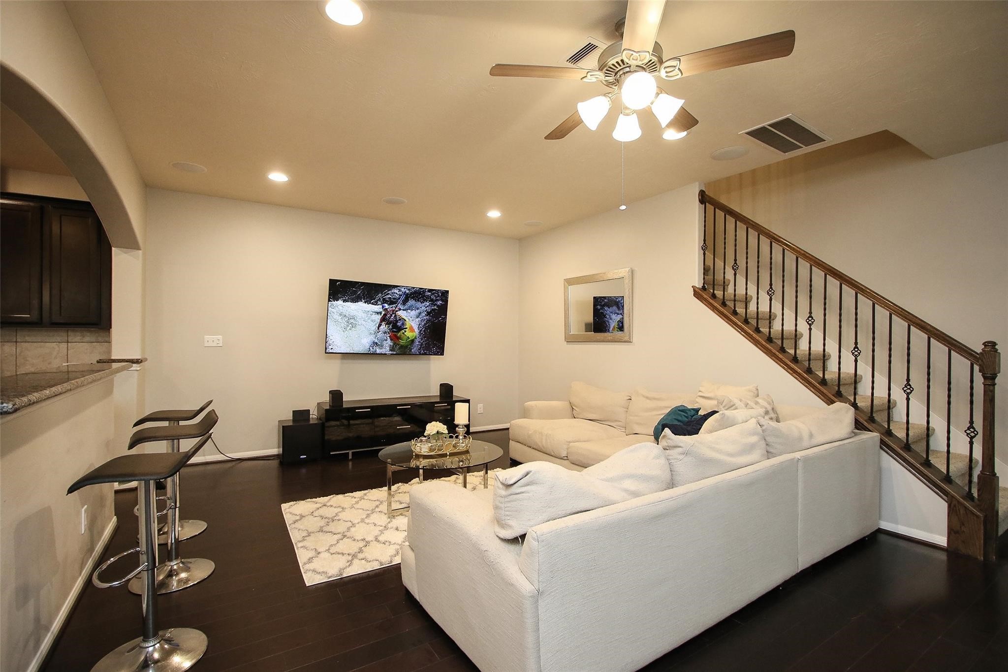 8517 Sunset Loch Drive Spring, TX 77379 - Photo 5 of 22 a living room with furniture and a flat screen tv