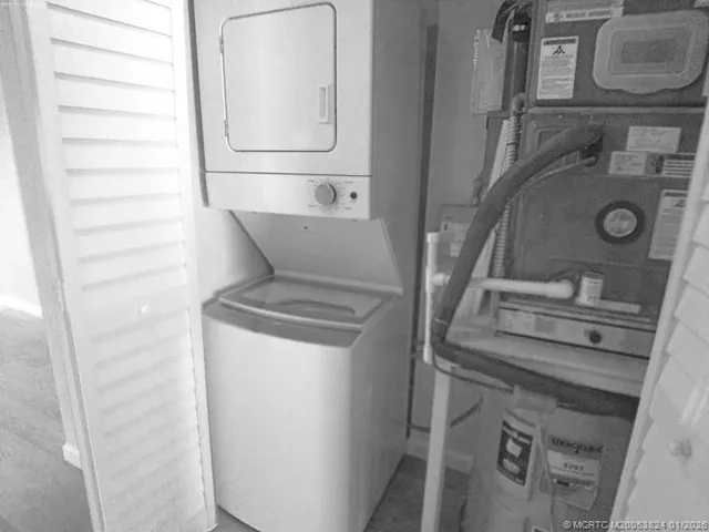 a view of a chairs and table in a yard