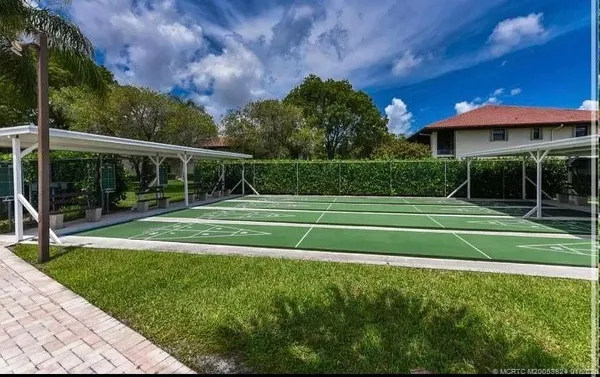 a view of swimming pool with a yard