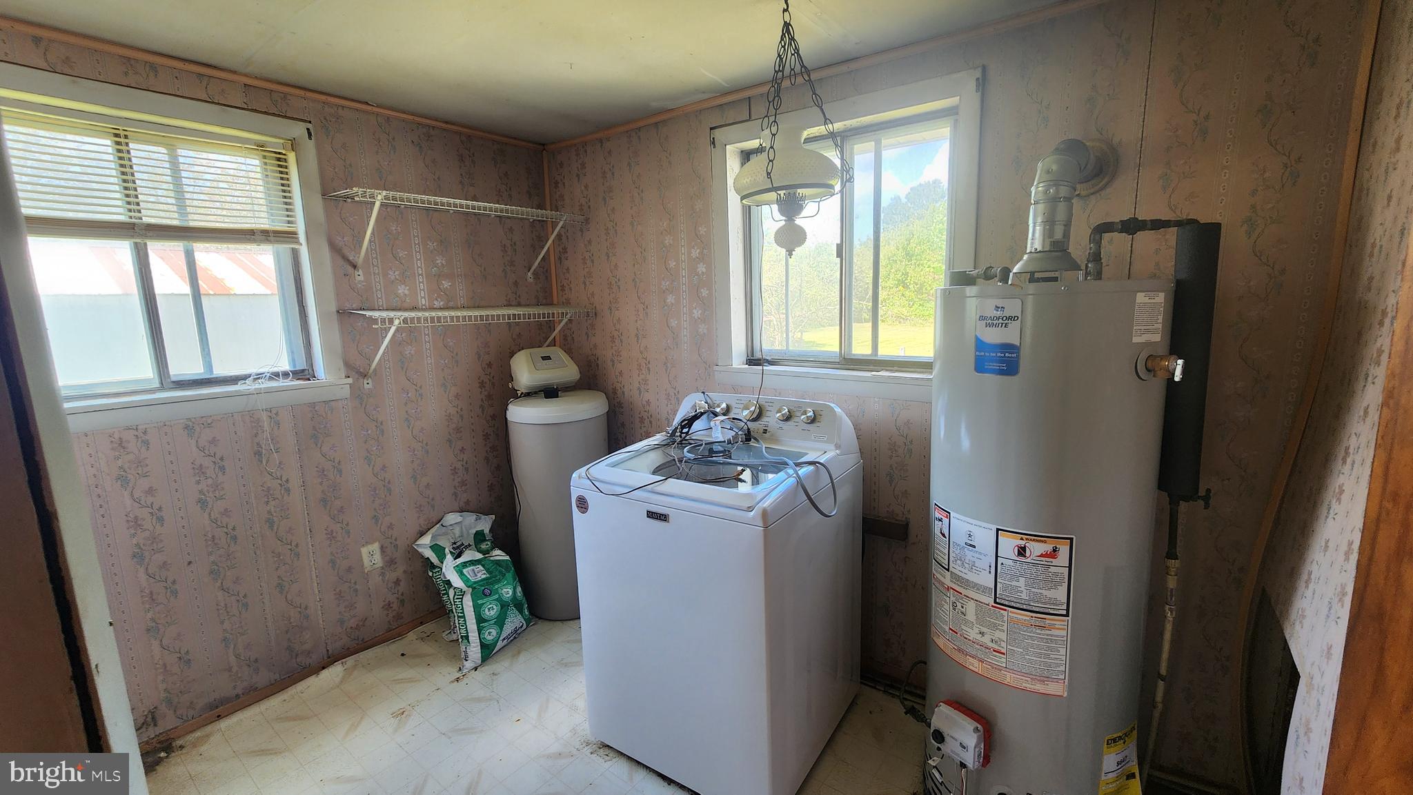 6289 Mud Mill Road Camden Wyoming, DE 19934 - Photo 10 of 10 a utility room with closet dryer and washer