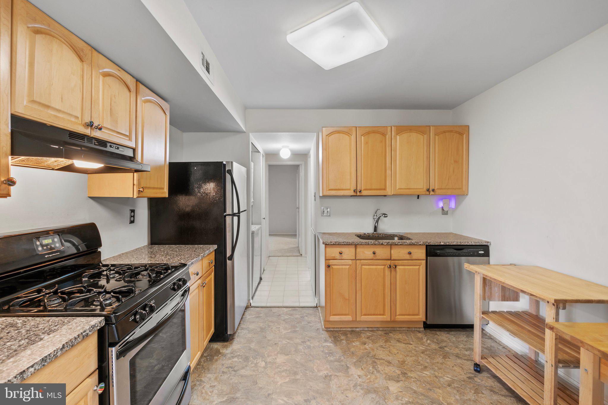 2002 Colts Neck Road, Unit 1A Reston, VA 20191 - Photo 7 of 22 Kitchen - New flooring