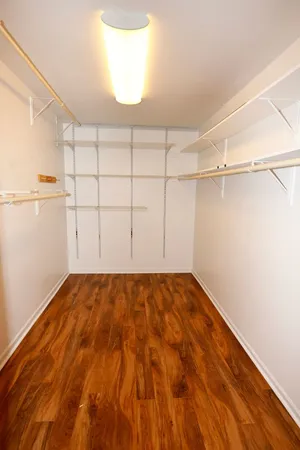 a view of a room with racks on the wall