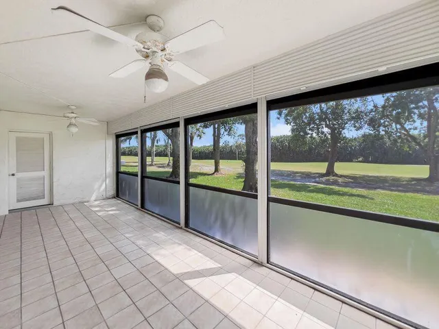 a view of gallery with windows
