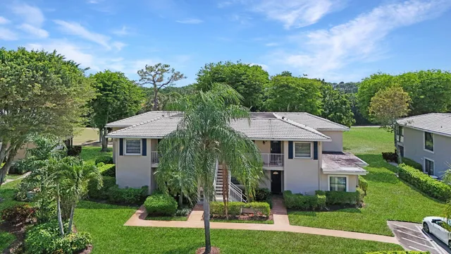 a front view of a house having patio