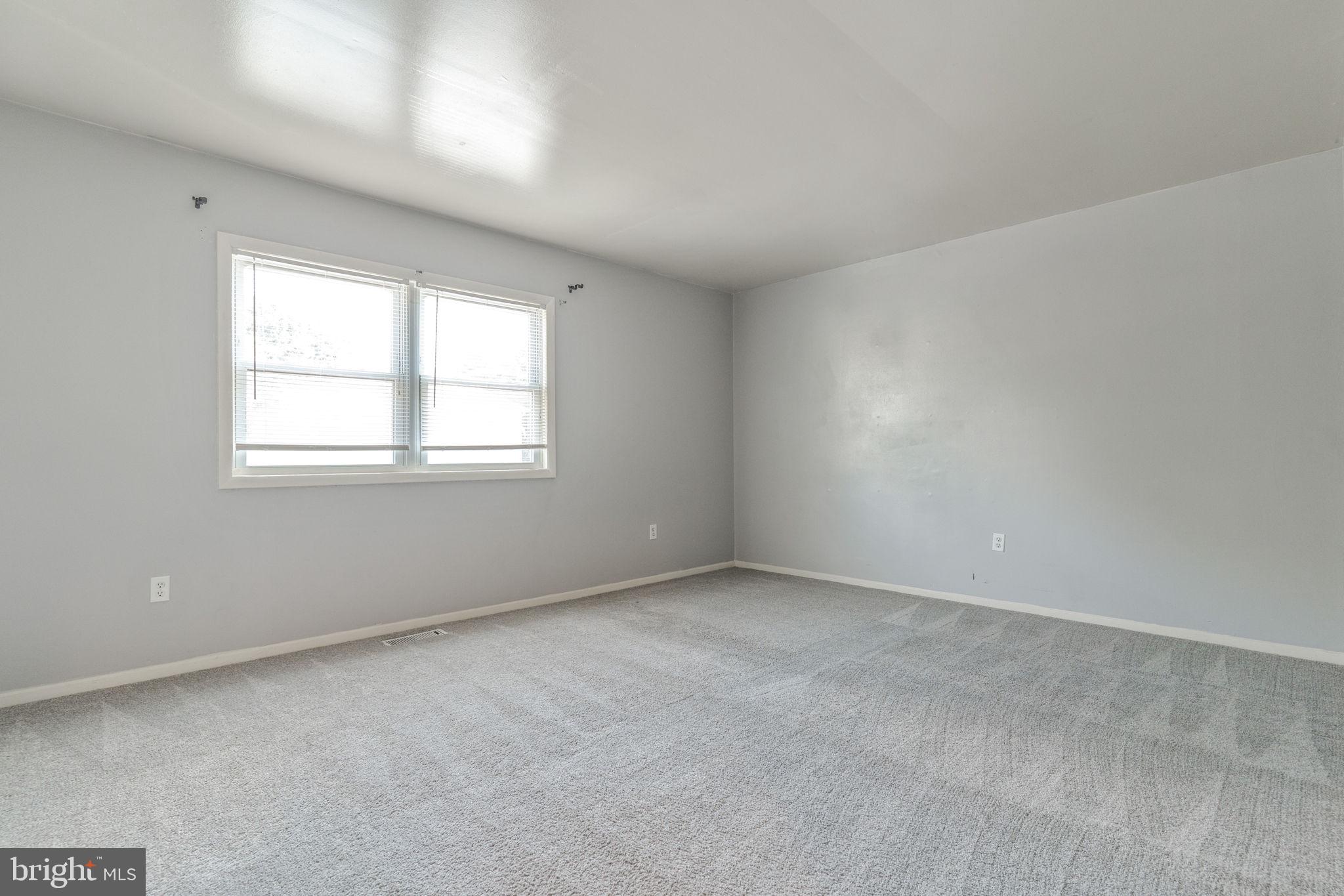 709 Olde Forge Drive Fredericksburg, VA 22405 - Photo 15 of 31 an empty room with windows