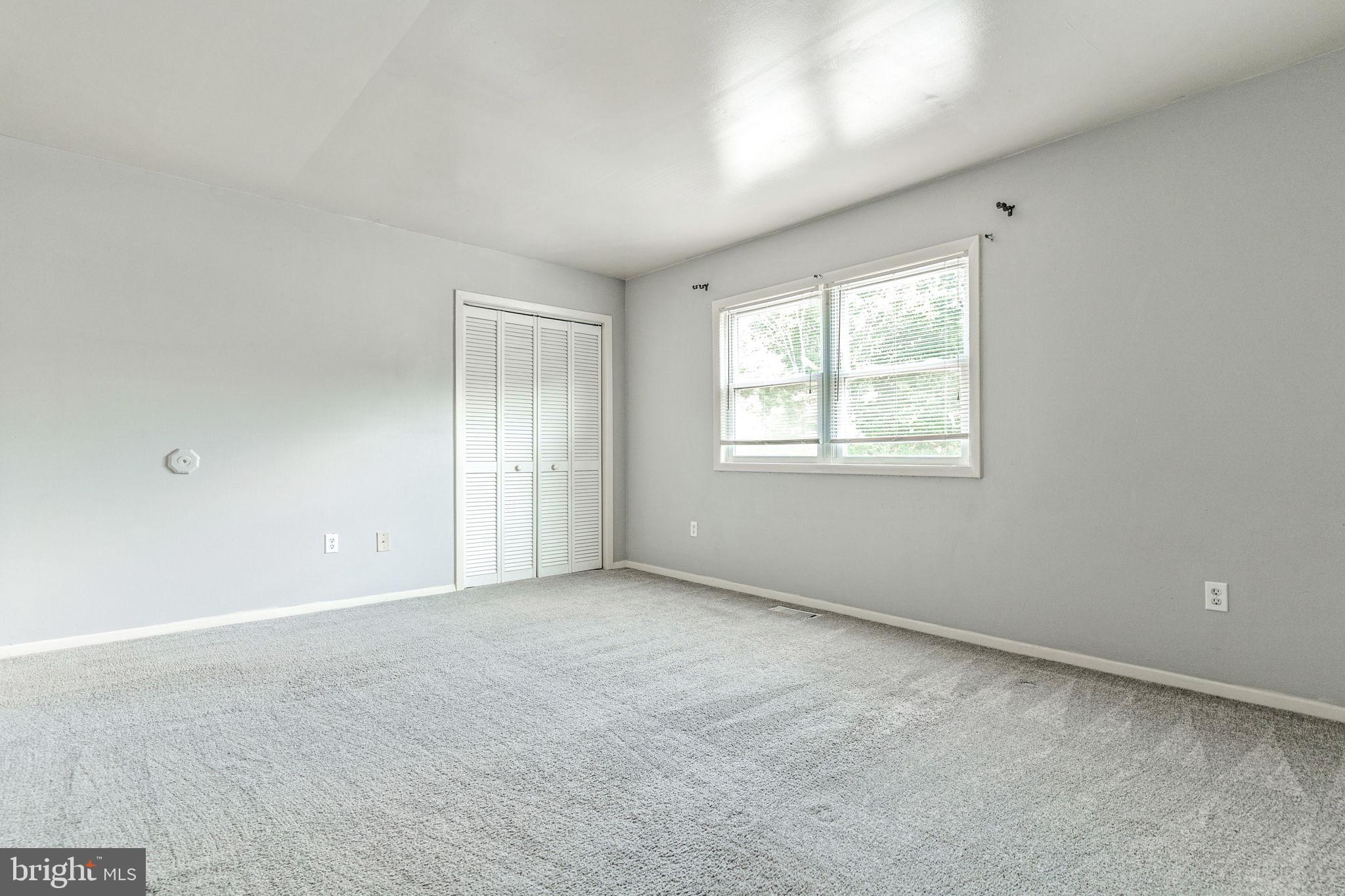 709 Olde Forge Drive Fredericksburg, VA 22405 - Photo 16 of 31 an empty room with windows