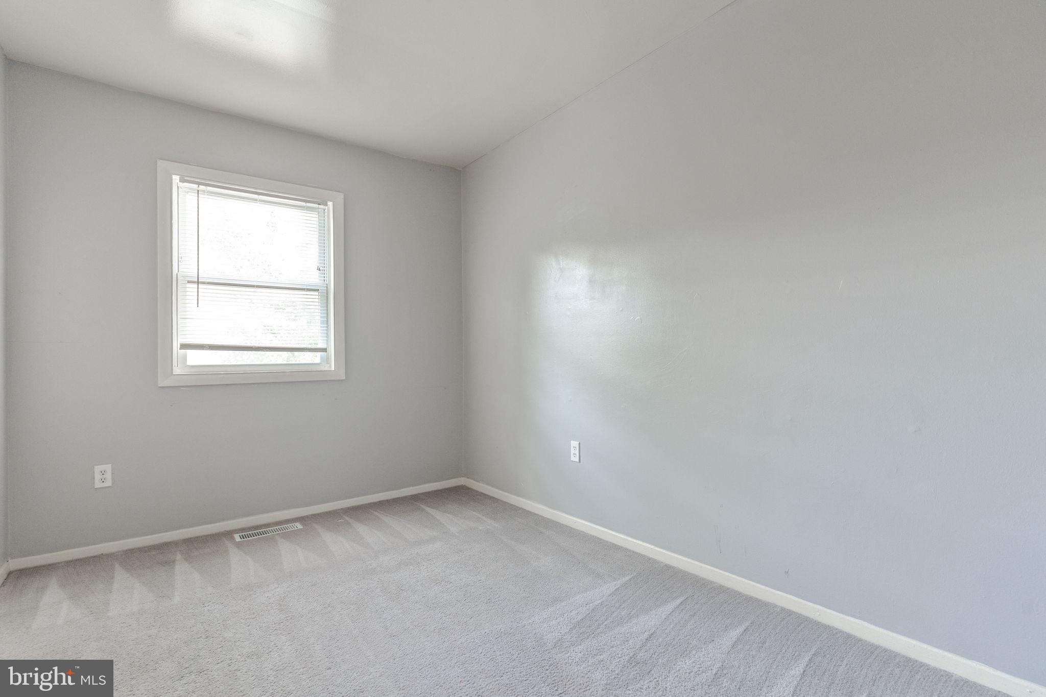 709 Olde Forge Drive Fredericksburg, VA 22405 - Photo 18 of 31 an empty room with a window