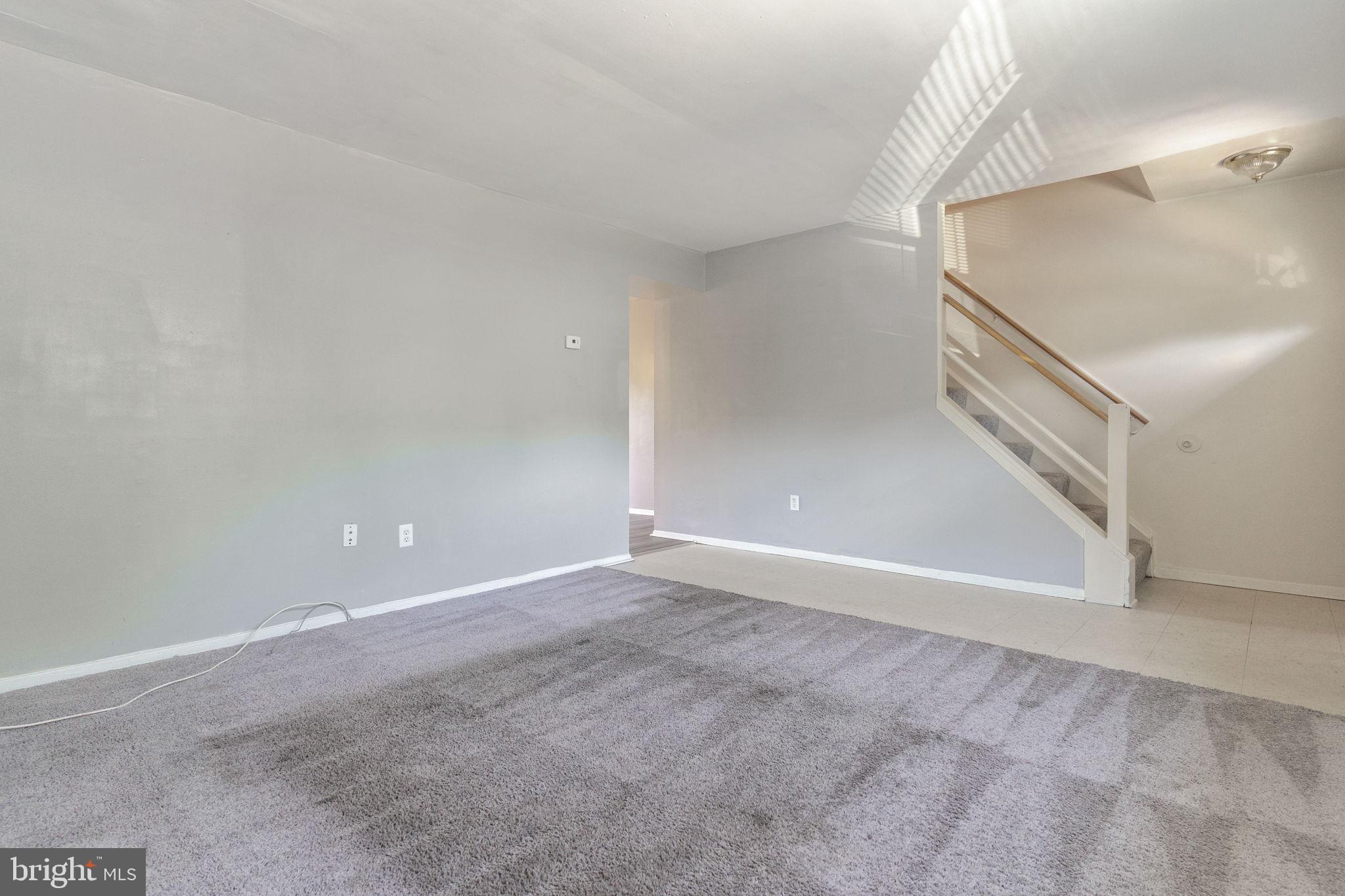 709 Olde Forge Drive Fredericksburg, VA 22405 - Photo 4 of 31 a view of an empty room with stairs