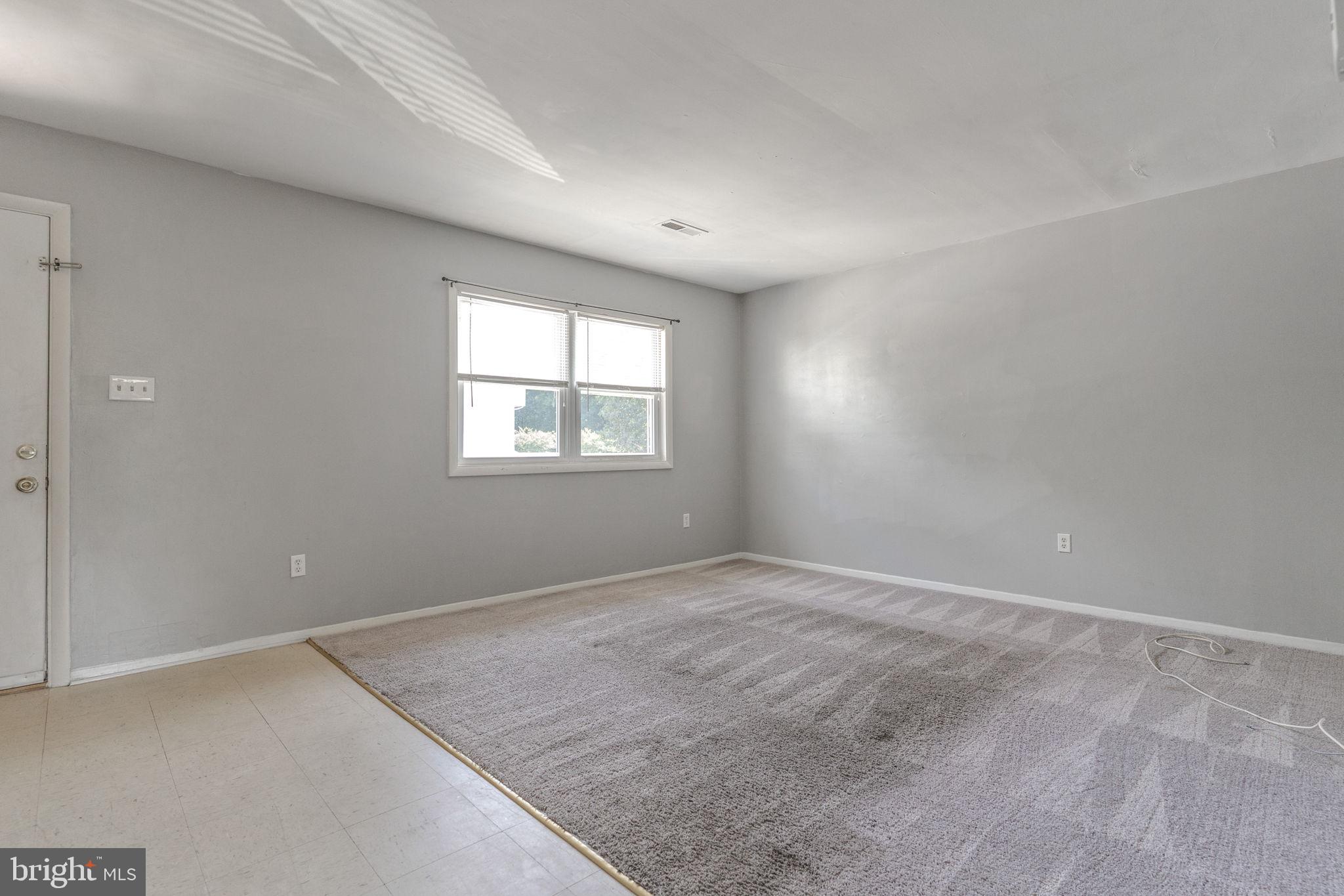 709 Olde Forge Drive Fredericksburg, VA 22405 - Photo 5 of 31 an empty room with windows
