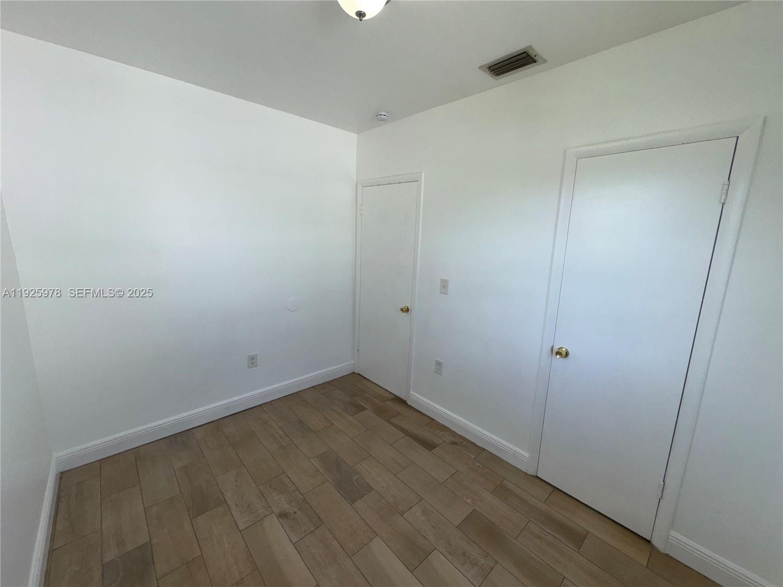 10840 Southwest 222nd Drive Miami, FL 33170 - Photo 13 of 21 a view of an empty room