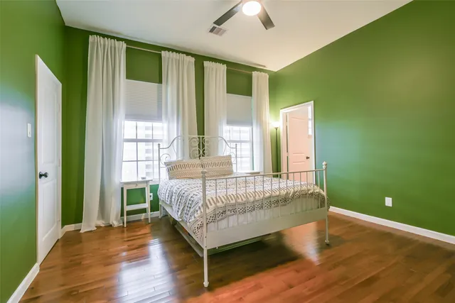 a room with a bed and a window