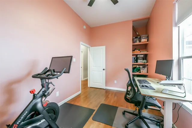 a workspace with furniture and wooden floor