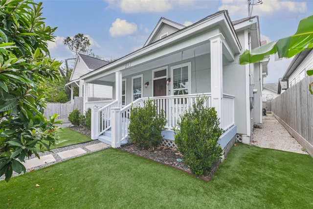 front view of a house with a yard