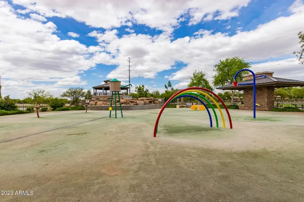 a view of a golf course with a lake