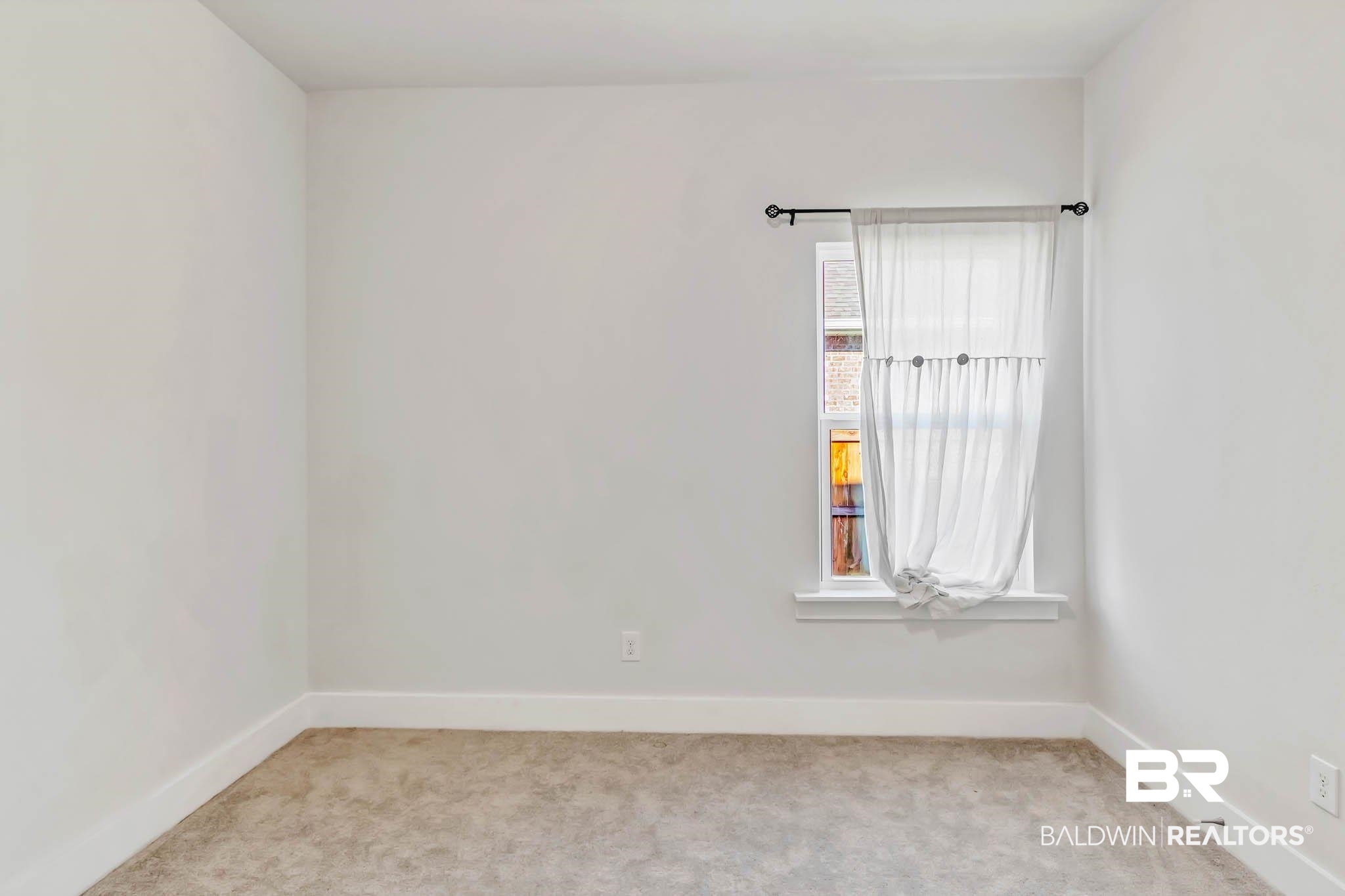 16461 Prado Loop Loxley, AL 36551 - Photo 30 of 78 Spare room with baseboards and light carpet