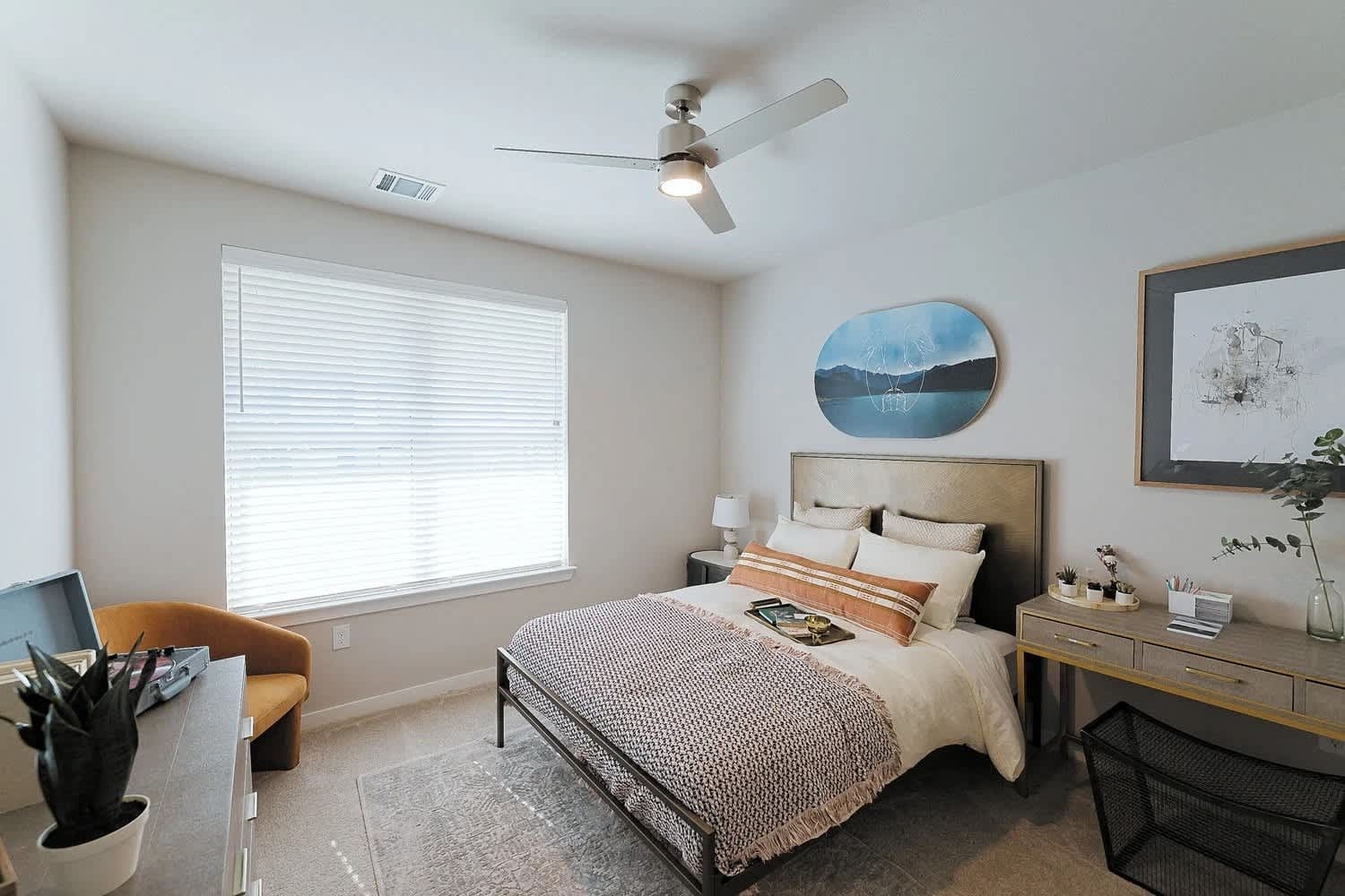12201 Dessau Road, Unit 4301 Austin, TX 78754 - Photo 4 of 12 a bedroom with a bed and a chandelier