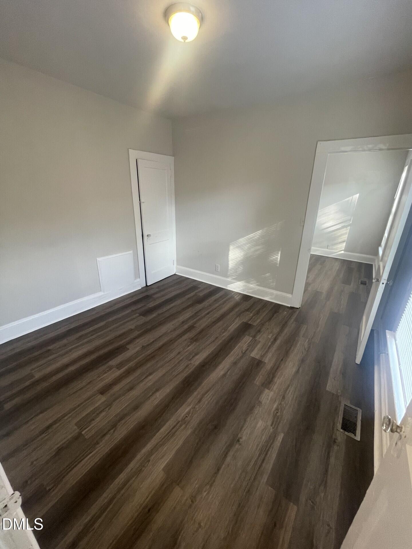 307 Kennedy Street Raleigh, NC 27610 - Photo 7 of 12 a view of an empty room