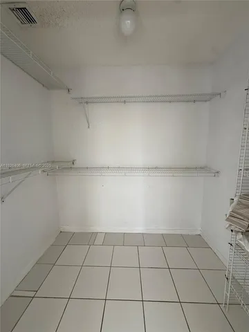 a view of a room and dishwasher