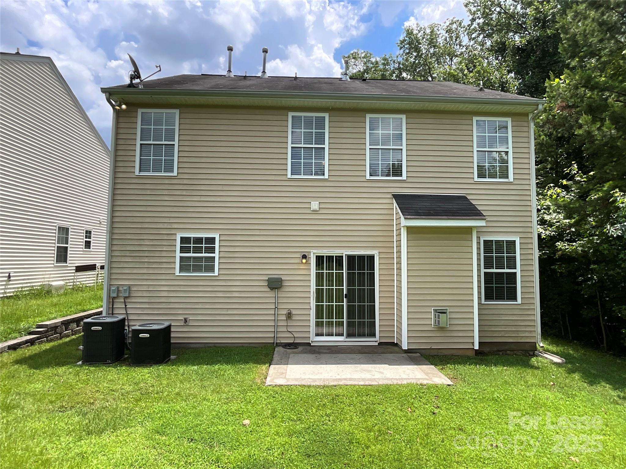 10846 Traders Court Davidson, NC 28036 - Photo 24 of 24 a front view of a house with a yard