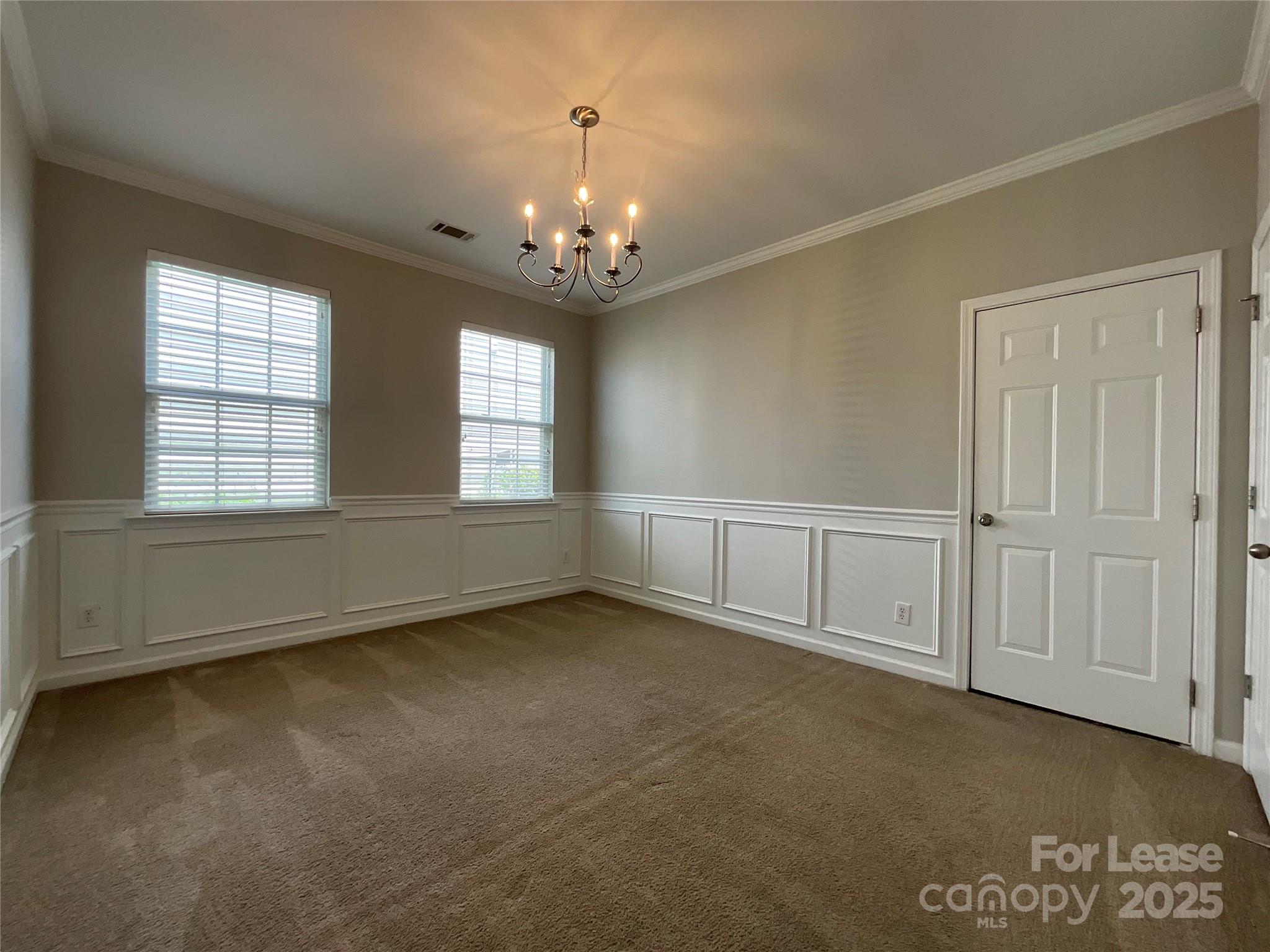 10846 Traders Court Davidson, NC 28036 - Photo 6 of 24 a view of an empty room with a window