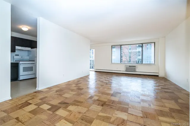 a view of a kitchen with a sink and a stove top oven