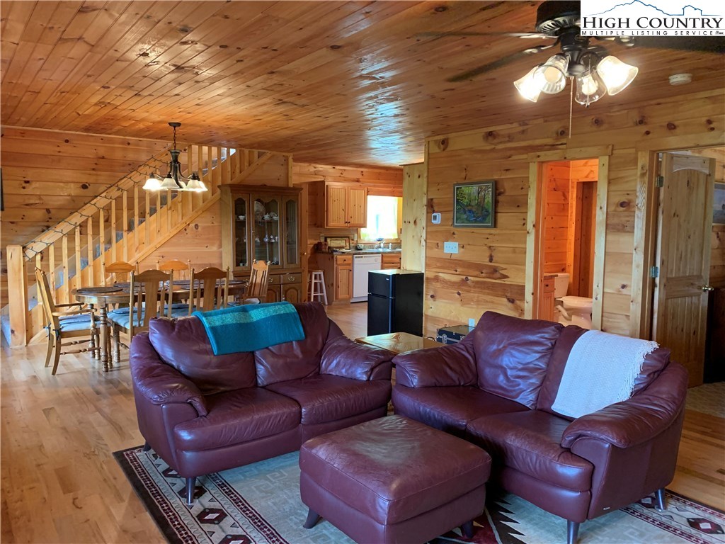 305 Wolf Pen Road Purlear, NC 28665 - Photo 24 of 40 a outdoor living space with furniture and a fireplace