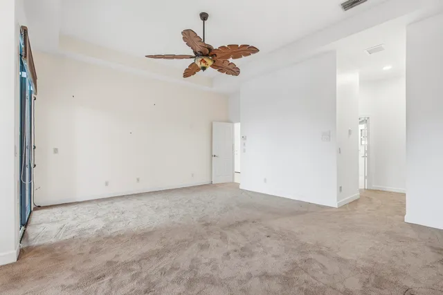 a bathroom with a toilet a sink and a mirror