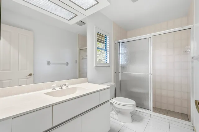 a view of a field with an ocean