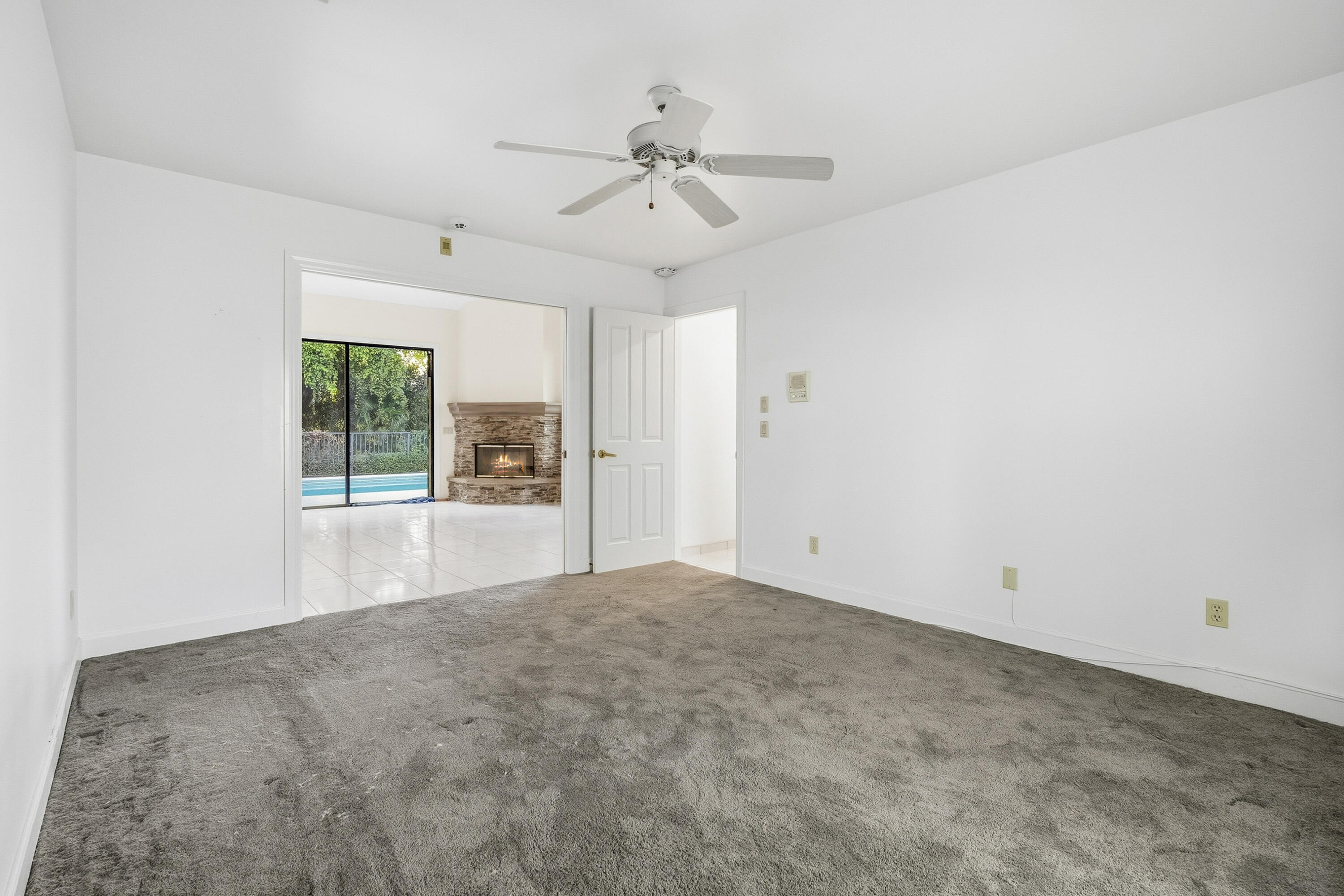 6469 Southeast Baltusrol Terrace Stuart, FL 34997 - Photo 37 of 65 a view of an empty room with a window