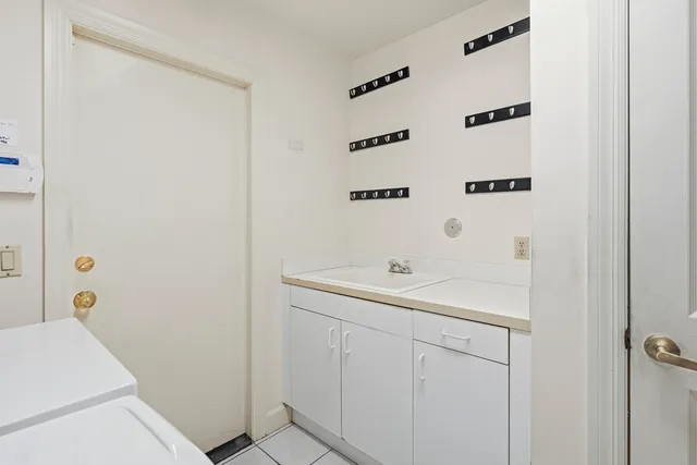 an aerial view of a house with swimming pool yard and outdoor seating