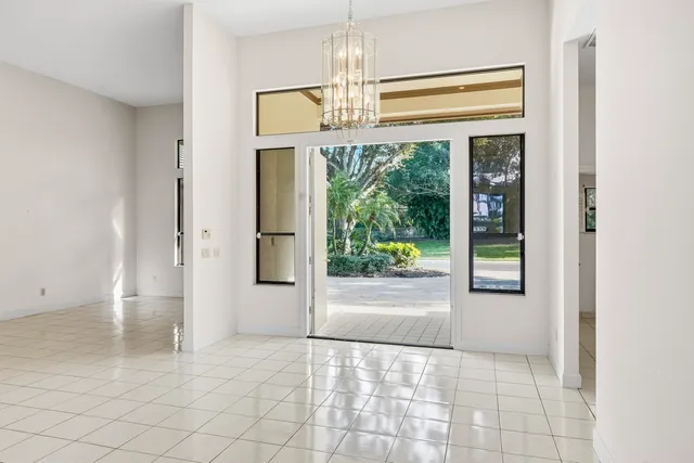 a view of kitchen with furniture and large window