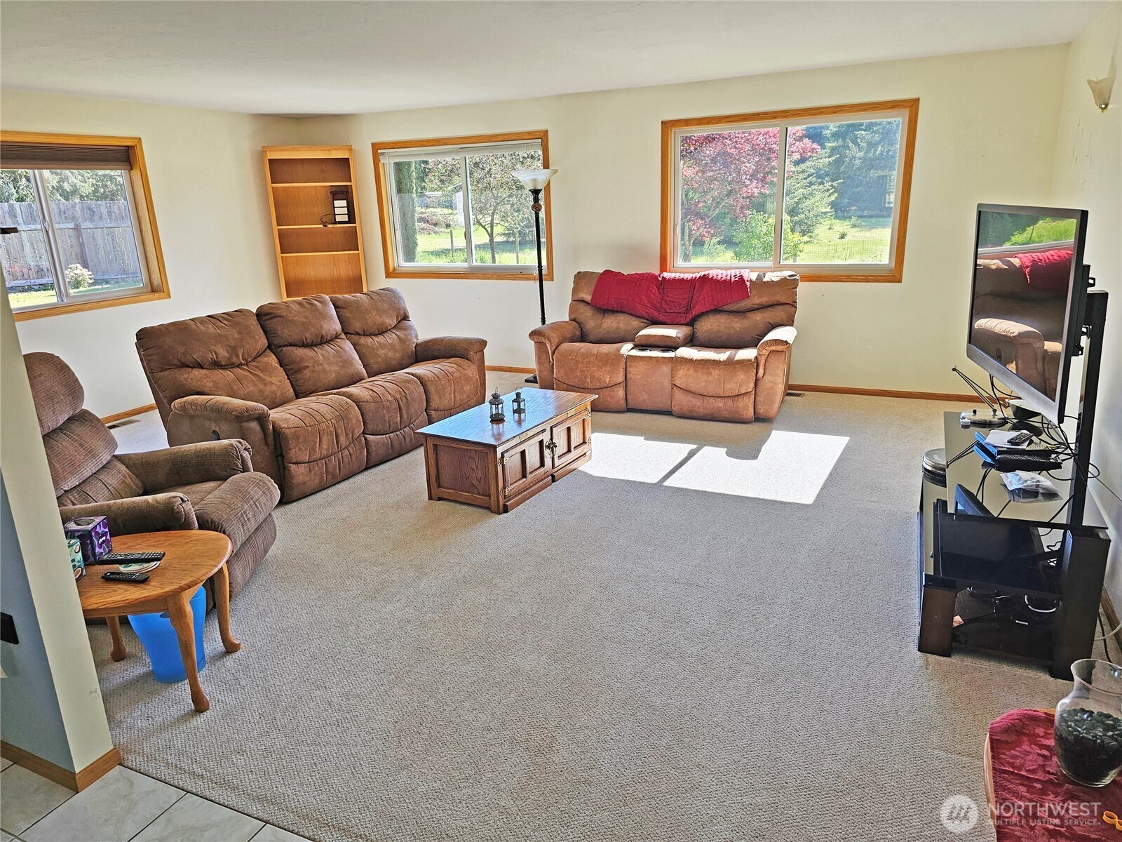 17103 Camas Run Lane Southwest Rochester, WA 98579 - Photo 17 of 40 a living room with furniture a rug and a window