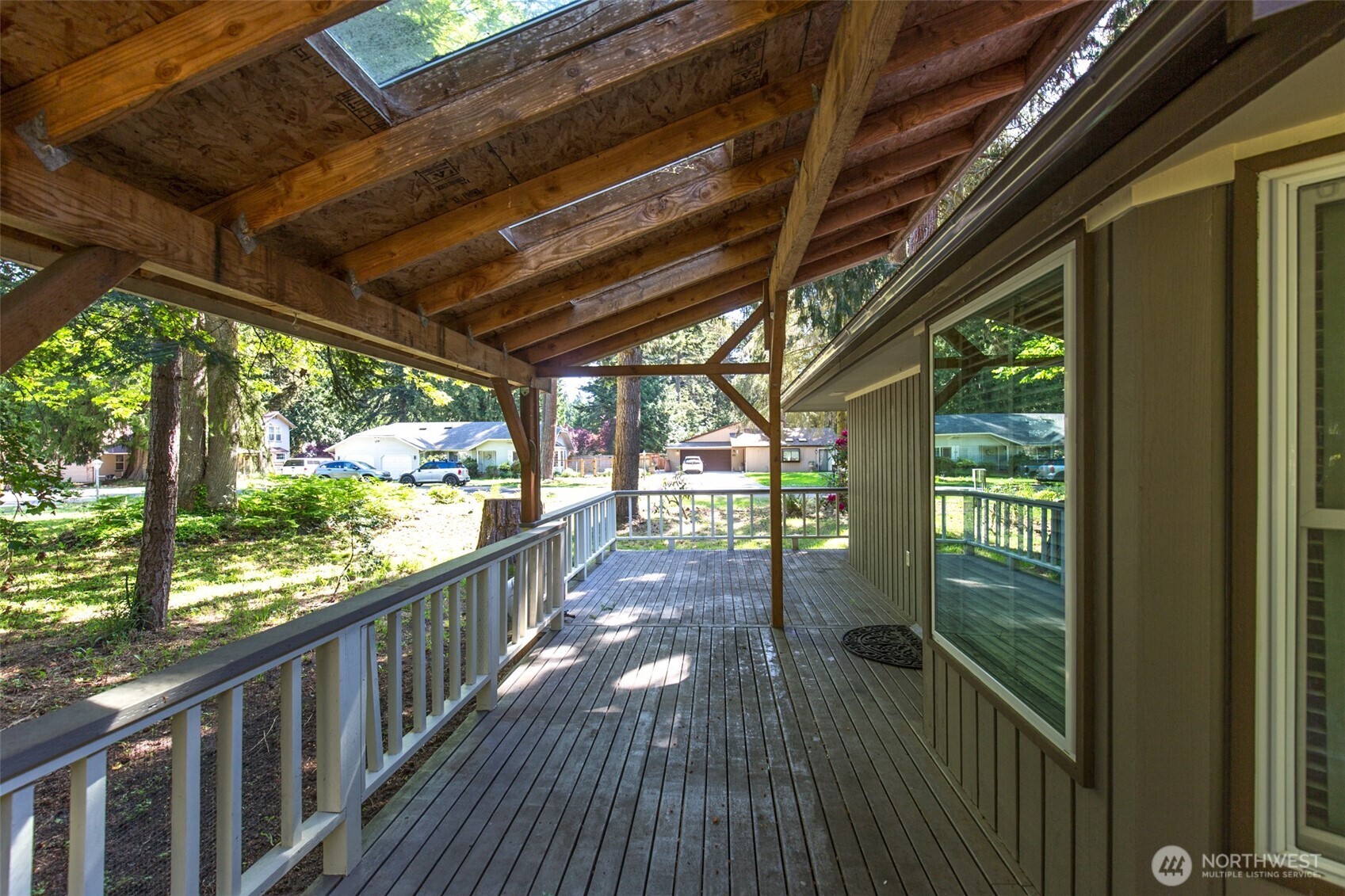 123 Forest Ridge Drive Sequim, WA 98382 - Photo 11 of 32 a view of porch with wooden floor