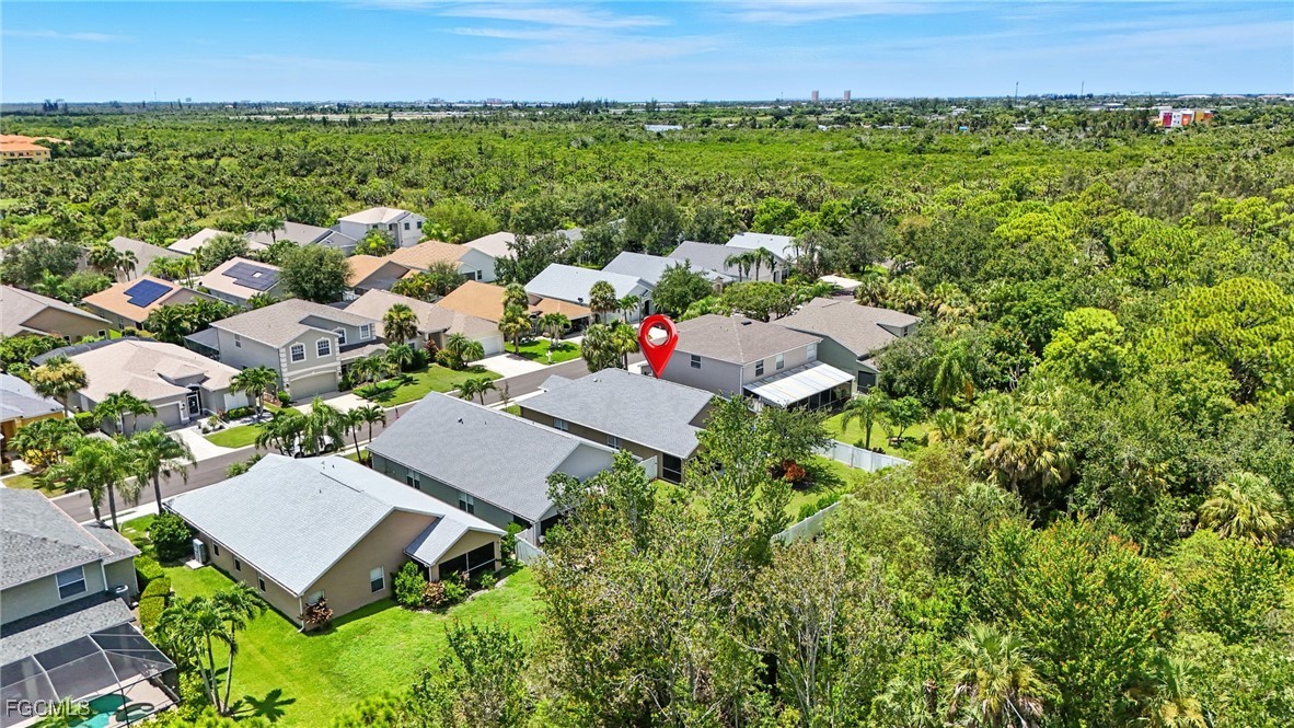 9740 Gladiolus Bulb Loop Fort Myers, FL 33908 - Photo 25 of 26 an aerial view of multiple house