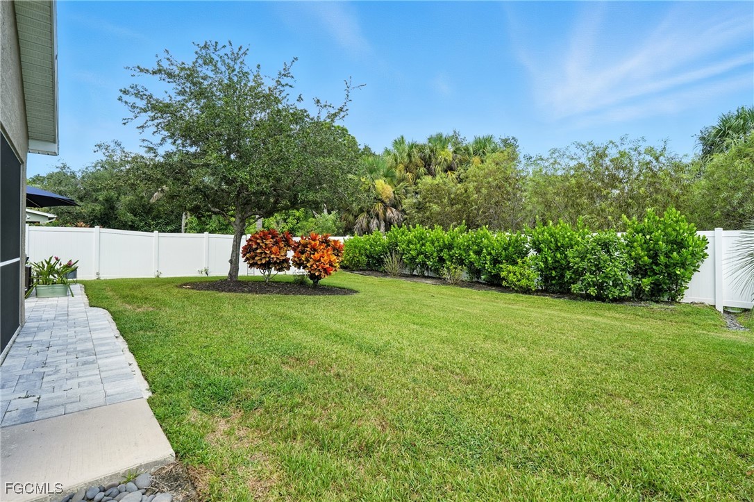 9740 Gladiolus Bulb Loop Fort Myers, FL 33908 - Photo 3 of 26 a garden view