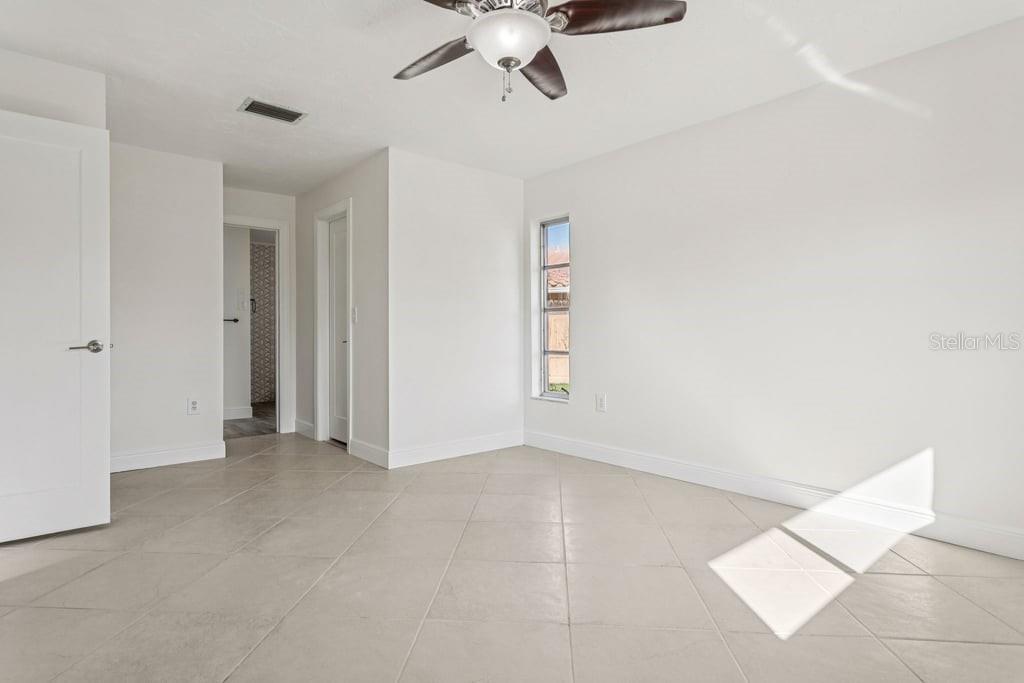 3734 Topsail Trail New Port Richey, FL 34652 - Photo 15 of 65 wooden floor in an empty room