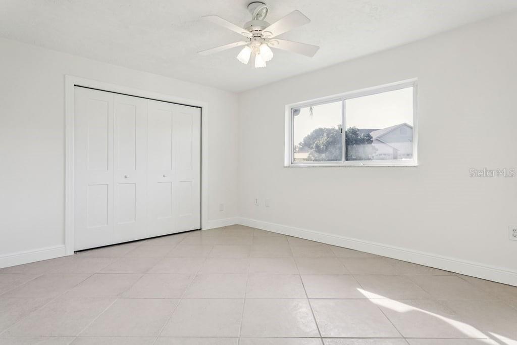 3734 Topsail Trail New Port Richey, FL 34652 - Photo 20 of 65 a view of an empty room with a window
