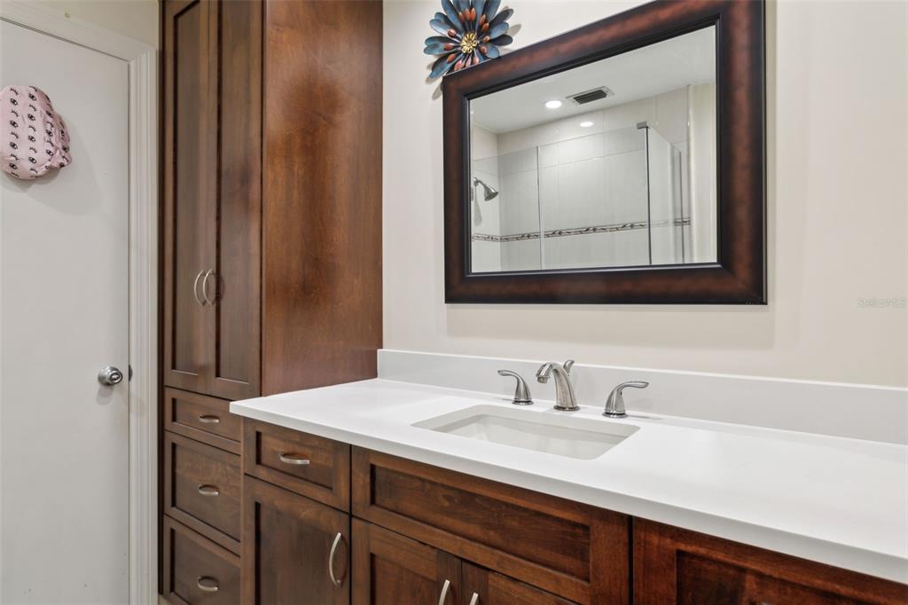 3734 Topsail Trail New Port Richey, FL 34652 - Photo 26 of 65 a bathroom with a sink vanity and a mirror