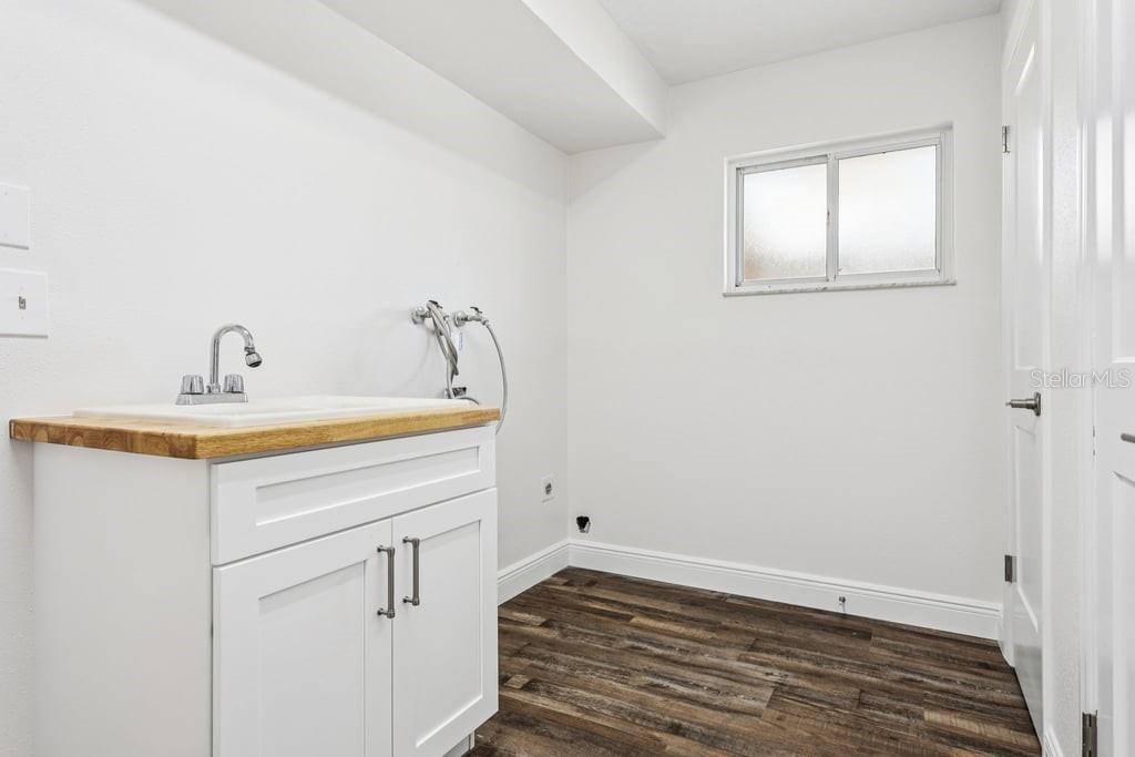 3734 Topsail Trail New Port Richey, FL 34652 - Photo 27 of 65 a bathroom with a sink and a mirror