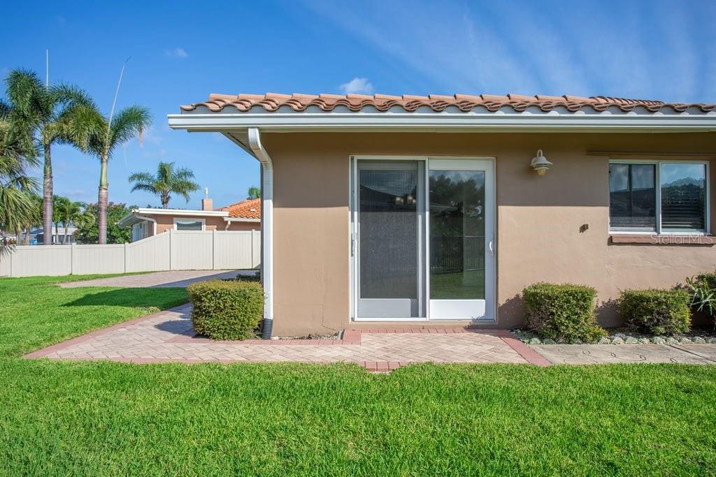 3734 Topsail Trail New Port Richey, FL 34652 - Photo 32 of 65 a view of a house with a yard and plants
