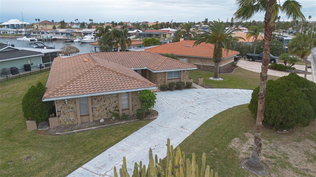 3734 Topsail Trail New Port Richey, FL 34652 - Photo 34 of 65 a view of a house with a yard