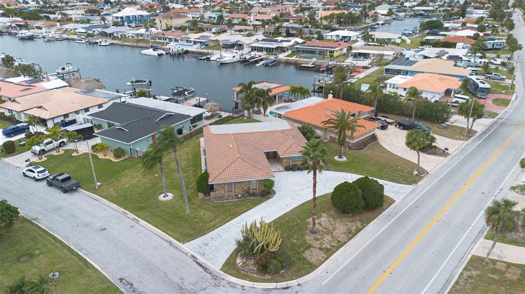 3734 Topsail Trail New Port Richey, FL 34652 - Photo 38 of 65 an aerial view of a house with a swimming pool