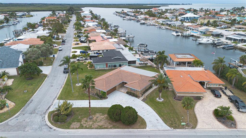 3734 Topsail Trail New Port Richey, FL 34652 - Photo 39 of 65 an aerial view of house with yard and ocean view
