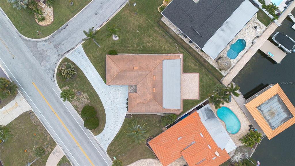 3734 Topsail Trail New Port Richey, FL 34652 - Photo 40 of 65 an aerial view of a house with a swimming pool
