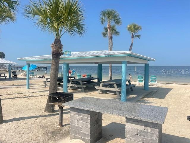 3734 Topsail Trail New Port Richey, FL 34652 - Photo 55 of 65 a view of a house with backyard porch and sitting area