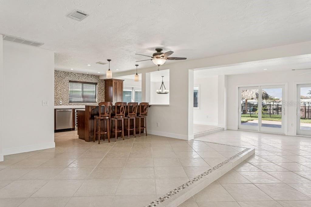 3734 Topsail Trail New Port Richey, FL 34652 - Photo 6 of 65 a view of workspace with furniture and chandelier