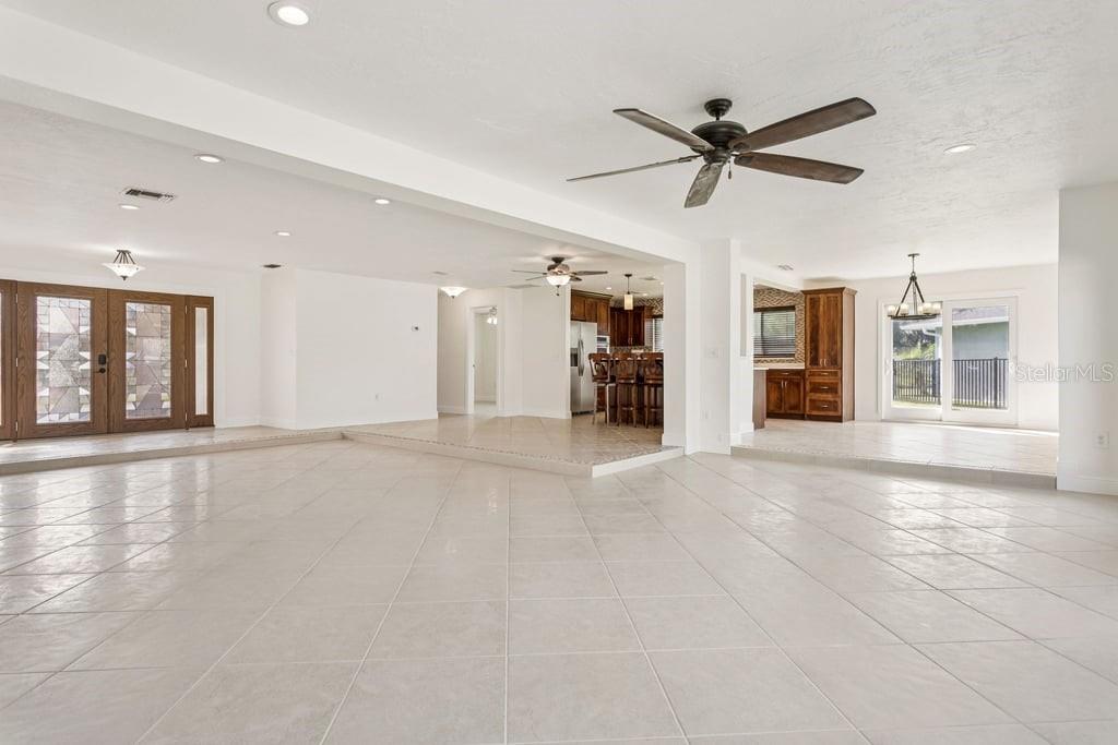 3734 Topsail Trail New Port Richey, FL 34652 - Photo 7 of 65 a view of an empty room with window and cabinet