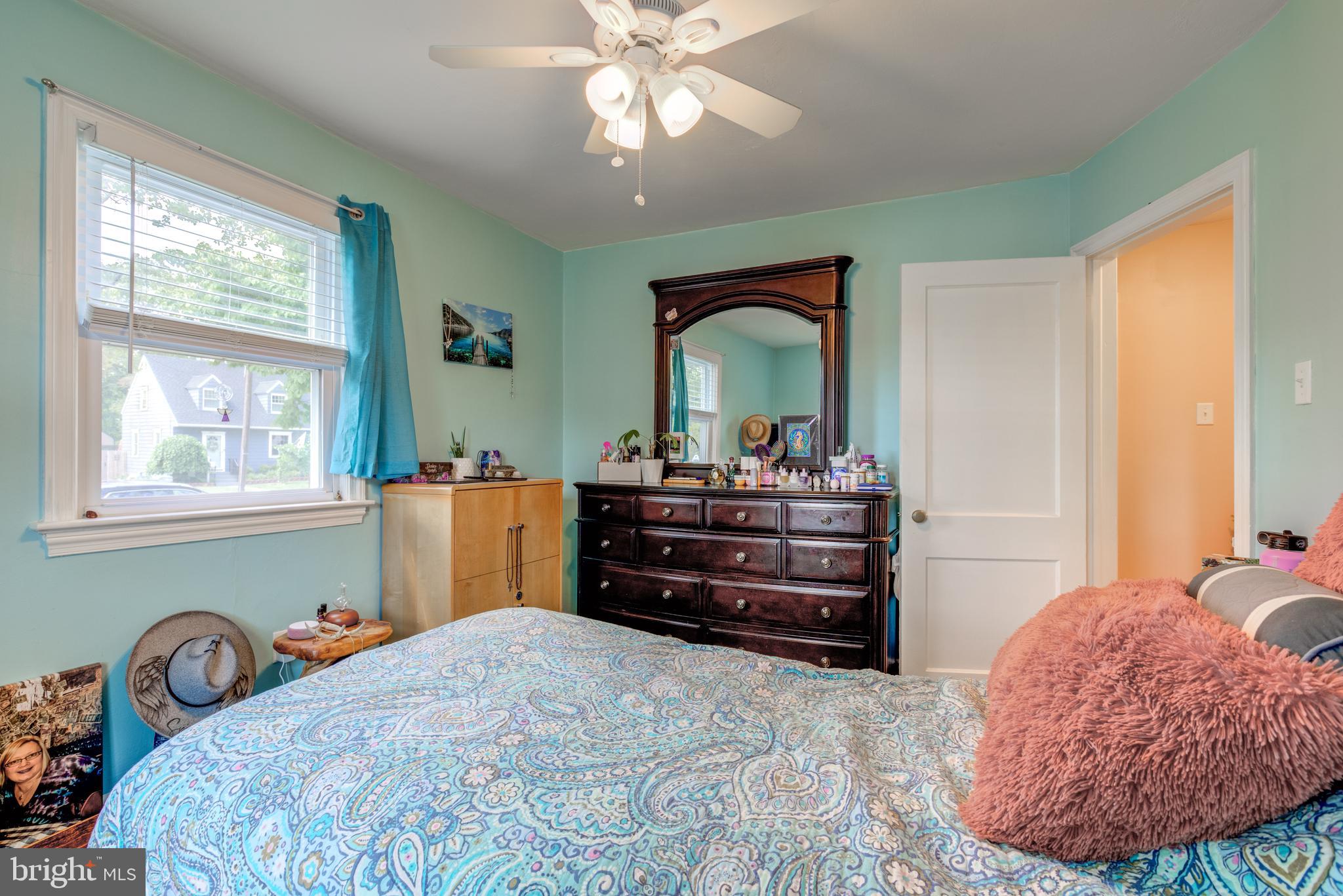 121 Leconey Circle Palmyra, NJ 08065 - Photo 12 of 33 a bedroom with a bed and a mirror