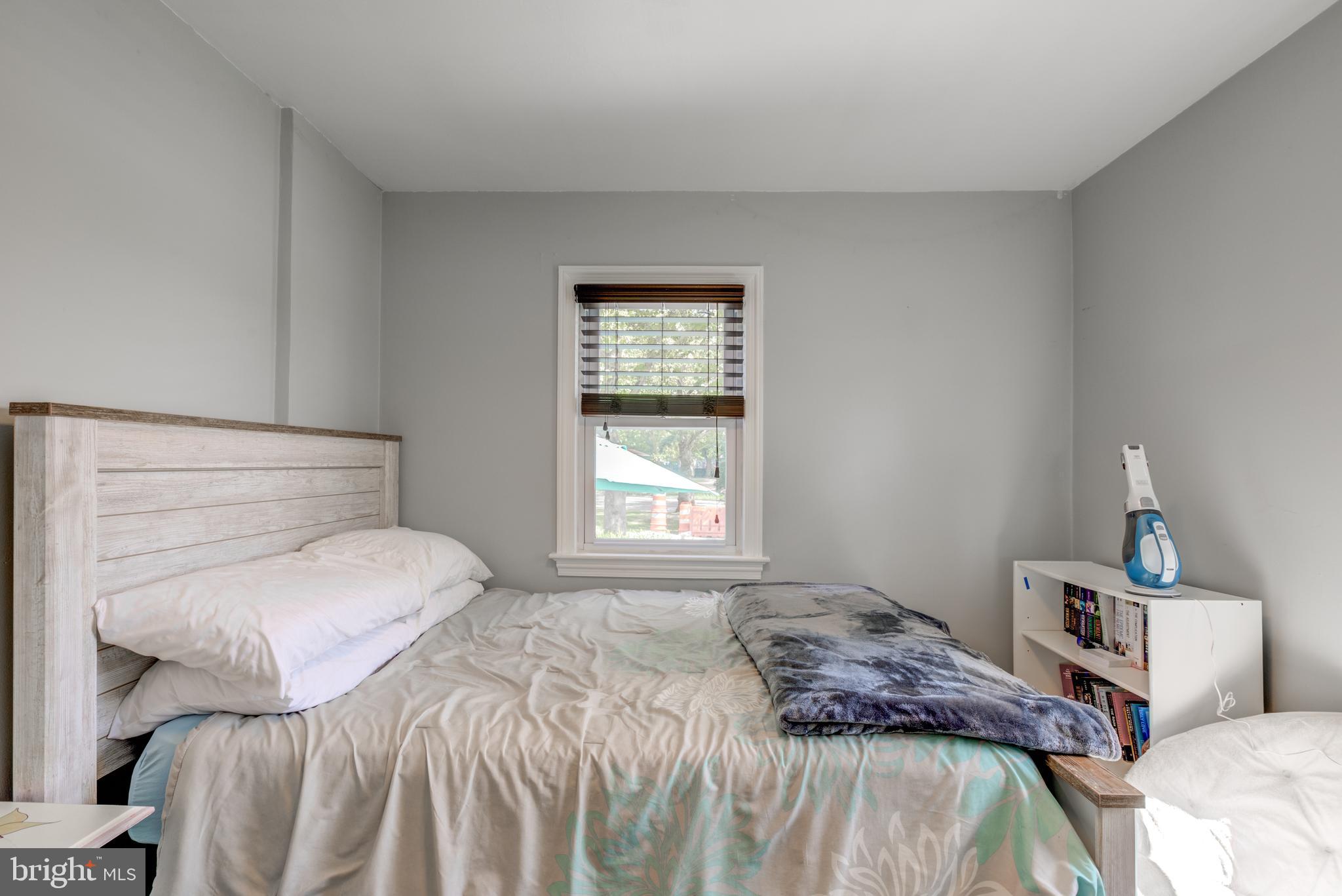 121 Leconey Circle Palmyra, NJ 08065 - Photo 14 of 33 a bedroom with a bed and a window